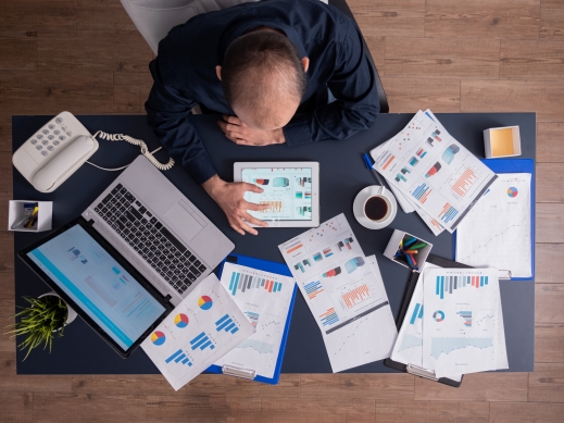 Consultants reviewing audit reports
